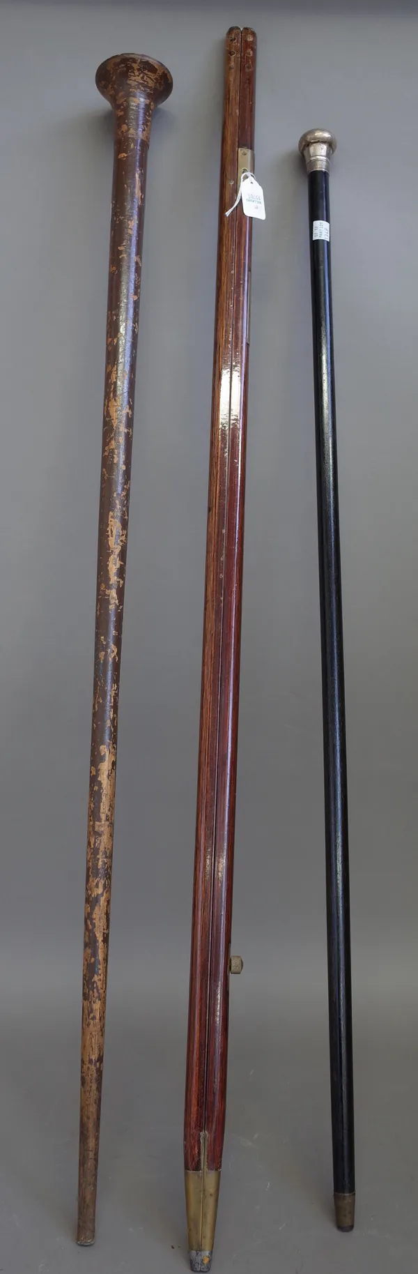 A hardwood and brass mounted yard measure (102cm), a silver mounted ebonised walking cane, a West Sussex Constabulary 'Billy stick' or baton and three