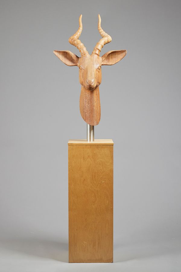 Bill Prickett, 'Antelope head', engineered wood, unsigned on a square wooden stand, 171cm high. DDS