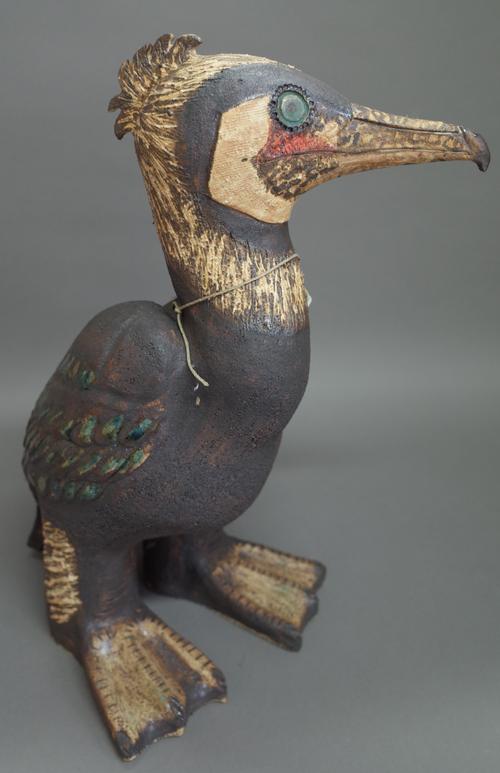 Tracey Eizabeth Wright; a stoneware 'Cormorant', polychrome decorated, incised to base, 40cm high.