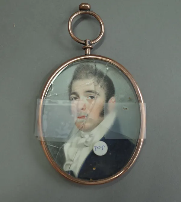 An early 19th century Anglo-Irish school portrait on miniature of a young man, white stock, blue coat, damaged gold coloured frame, image 6.2cm high.