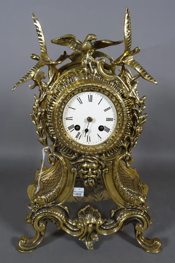 A Louis XV style gilt brass mantel clock, 40cm high.   D6