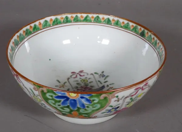 A Chinese famille rose bowl, early 20th century, painted with panels enclosing baskets of flowers, 19cm diameter.  CAB