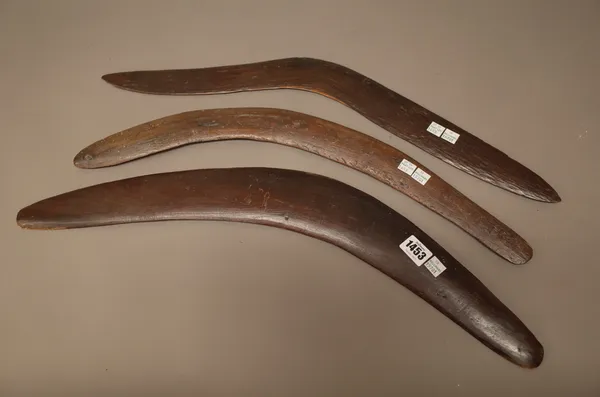 Three Australian Aboriginal hardwood boomerangs, the longest 61cm (3).