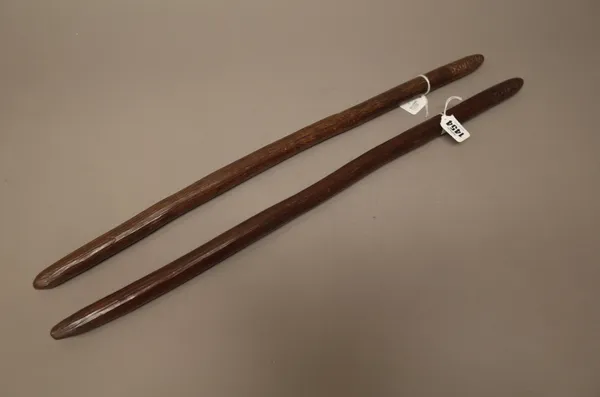 Two Australian Aboriginal hardwood digging sticks, the longest 59cm, (2).