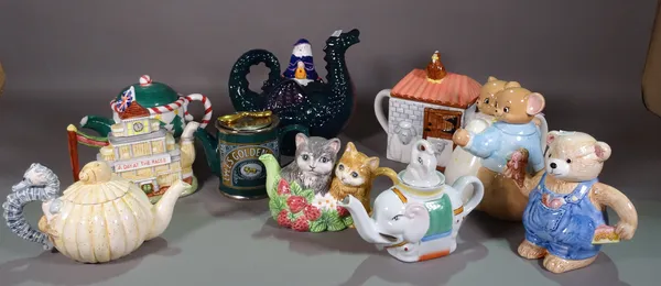 A quantity of decorative novelty tea pots including Golden Syrup, collages and sundry, (qty).  S3T
