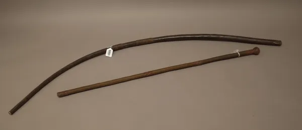 A South African leather whip, with wire banded decoration of naturalistic curved form (110cm) and another South African wire bound stick, with spheric