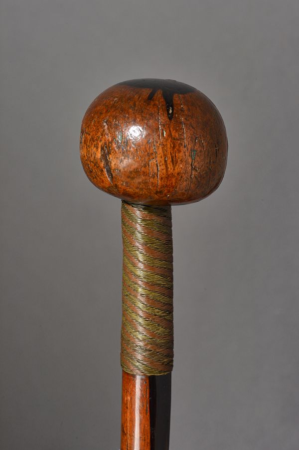 A African Zulu knobkerry (Knobkierie), two tone hardwood with bulbous head and wire bound handle, (37cm- cut down). Illustrated