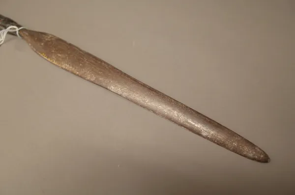 A South African Zulu stabbing spear, with leather binding, 122cm.