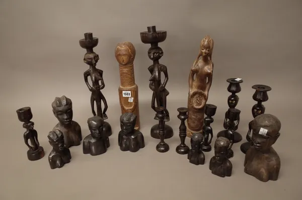 A quantity of African carved wooden tribal figures, the tallest 38cm, (18).