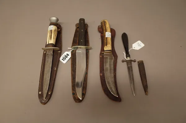 A Victorian Bowie knife, by William Rodgers with 6 inch polished steel blade and two piece horn handle, another early 20th century dagger, by William