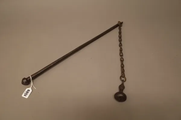 A Victorian steel mace, the bar handle with linked chain suspending an iron ball, 89cm overall.
