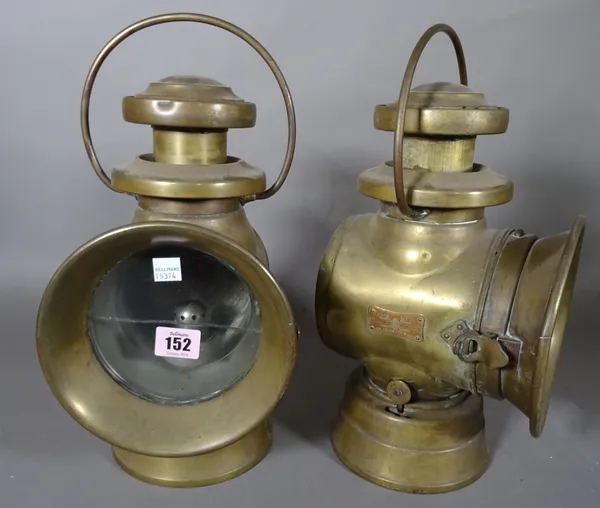 A pair of five inch Lucas 'Kind of the Road' green painted brass cased automobile oil lamps, (2).  I7