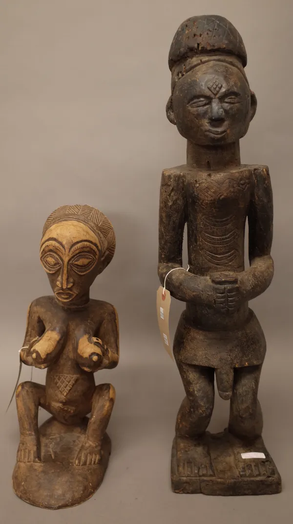 Two central African carved wooden fertility figures, the tallest 70cm, (2).
