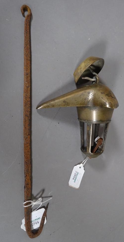 A Jewish bronze hanging oil lamp, possibly 17th century, of open frame form with an iron hanging bracket, bronze lamp 14cm high.  CAB
