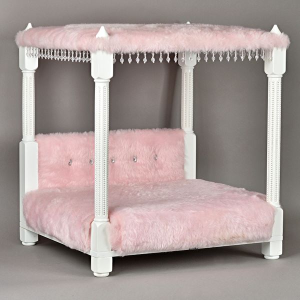 A 21st century faux pink fur and Swarovski mounted four poster cat bed, 62cm wide x 68cm high. Illustrated