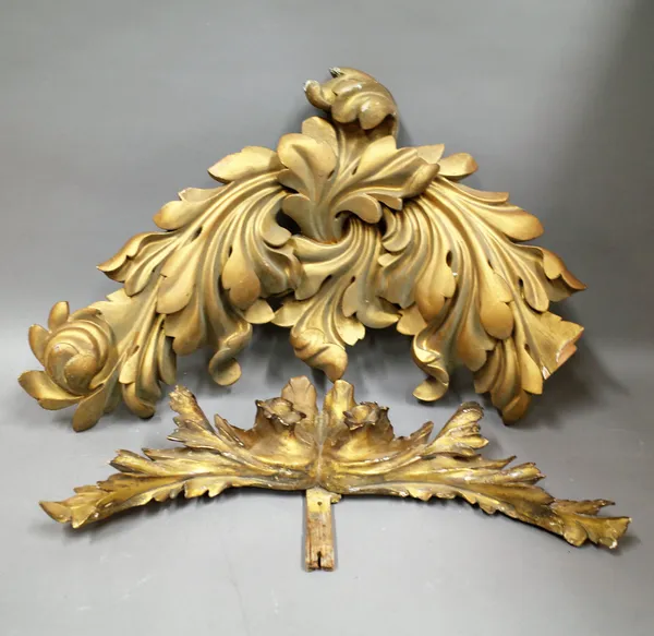 A pair of 19th large century gilt gesso acanthus corner mounts, 61cm x 48cm together with the lower frieze of a Victorian convex mirror, 60cm wide, (2