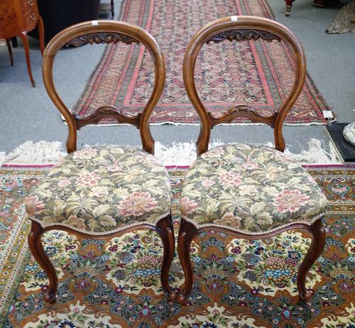 A set of six Victorian balloon back dining chairs, with serpentine seat, 49cm wide x 47cm high, (6).
