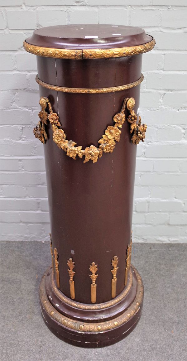 A gilt metal mounted brown painted column/ jardiniere stand, 38cm diam x 112cm high. 58