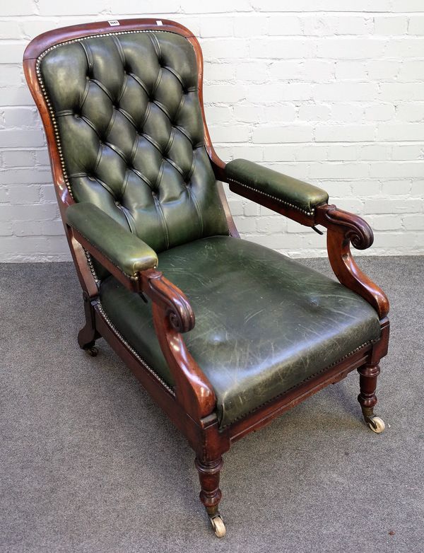 A William IV and later mahogany framed open armchair, with integral footstool, on turned supports, 60cm wide x 100cm high.