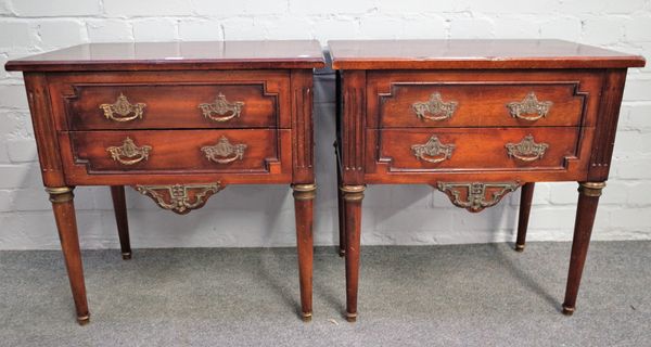 A pair of Empire style gilt metal mounted mahogany two drawer bedside tables, on tapering turned supports, 60cm wide x 61cm high (2).