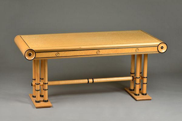 In the manner of David Linley; an inlaid bird's eye maple rectangular centre table, with three frieze drawers on turned supports, 170cm wide x 75cm de