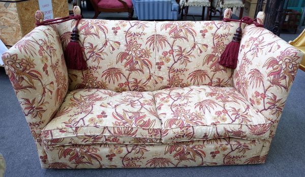 A 20th century Knole settee with floral upholstery, 180cm wide x 100cm high.