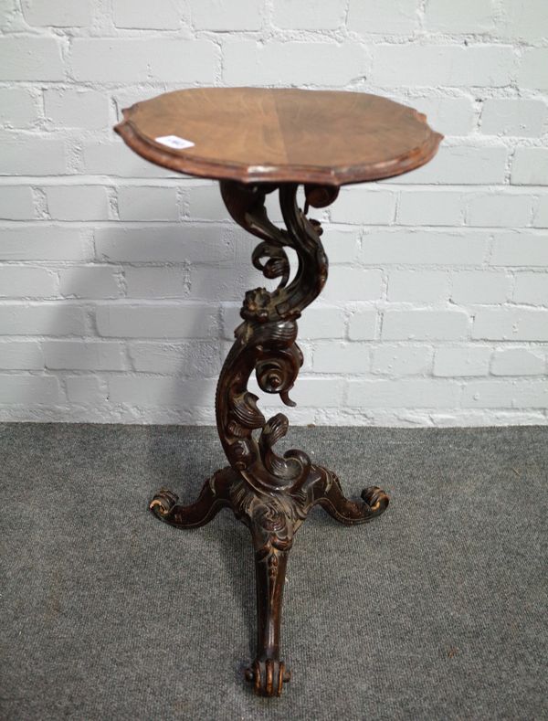 An Italian 18th century and later occasional table on floral scroll carved column and tripod base, 35cm wide x 70cm high.  4751