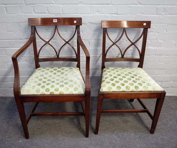 A set of ten George III style tulipwood banded mahogany lattice back dining chairs, on tapering square supports to include a pair of carvers. (10).