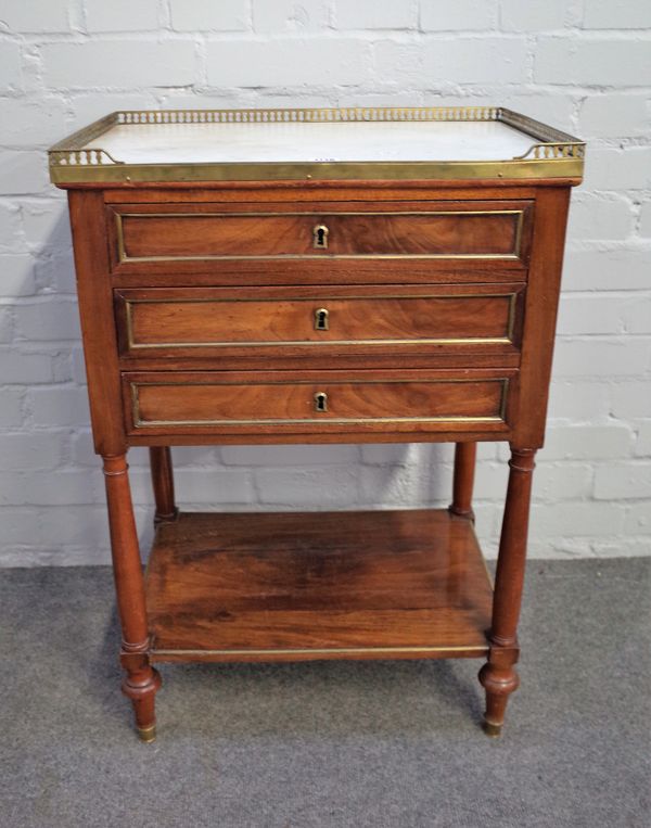 A 19th century French petite commode, the brass galleried marble top over three drawers and platform undertier, 54cm wide x 80cm high.