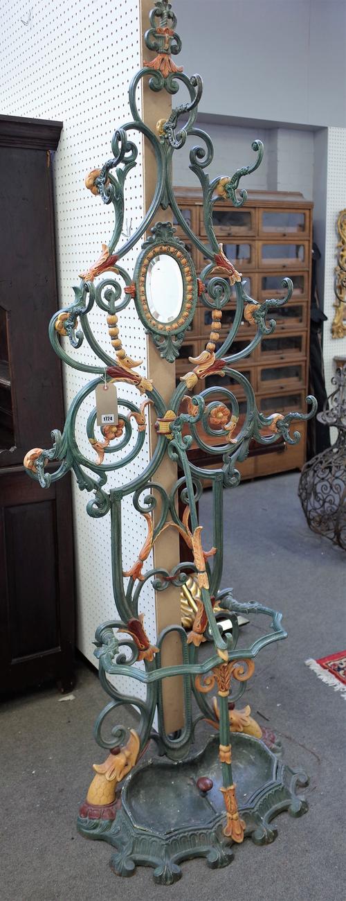 After Coalbrookdale; a polychrome painted cast iron umbrella/stick stand, 81cm wide x 212cm high.