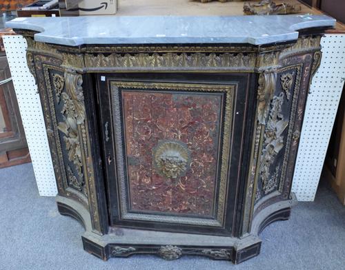 A mid-19th century French side cabinet, the grey marble top over a gilt metal mounted ebonised single door base, 145cm wide x 113cm high.