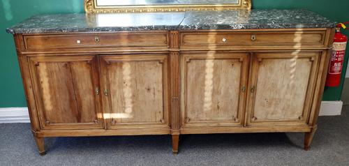 A large 19th century French side cabinet, the marble top (a.f) over a fruitwood base with pair of drawers over cupboards, on tapering square supports,