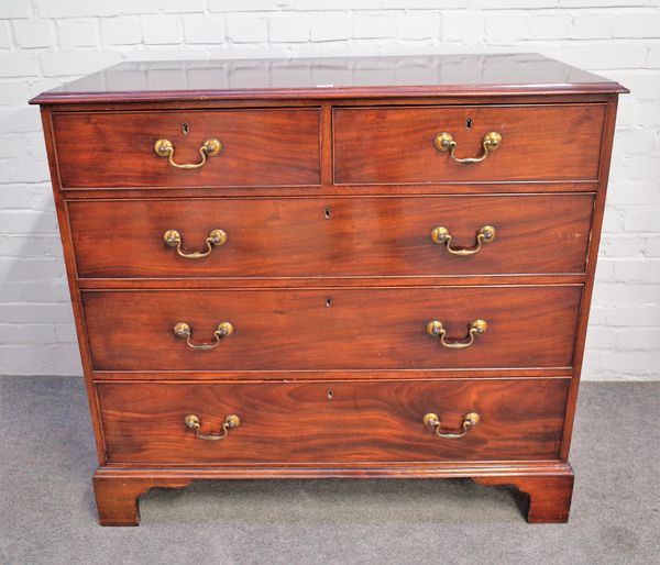 A George III mahogany chest of two short and three long graduated drawers on bracket feet, 113cm wide x 103cm high.