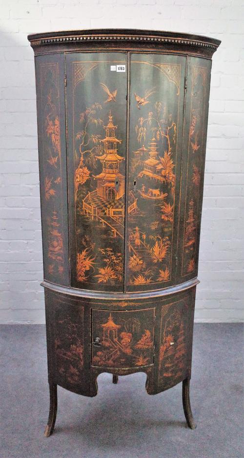 A George III and later bowfront green lacquer chinoiserie decorated floor standing corner cabinet, on splayed supports, 73cm wide x 180cm high.