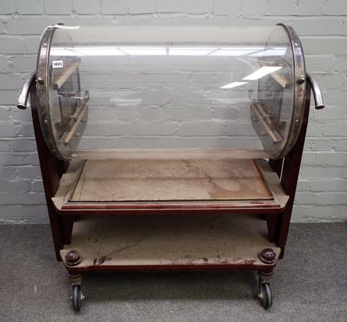 Christofle Paris; a pair of mid 20th century silver plated roll top serving trolleys 94cm wide x 110cm high, (a.f).