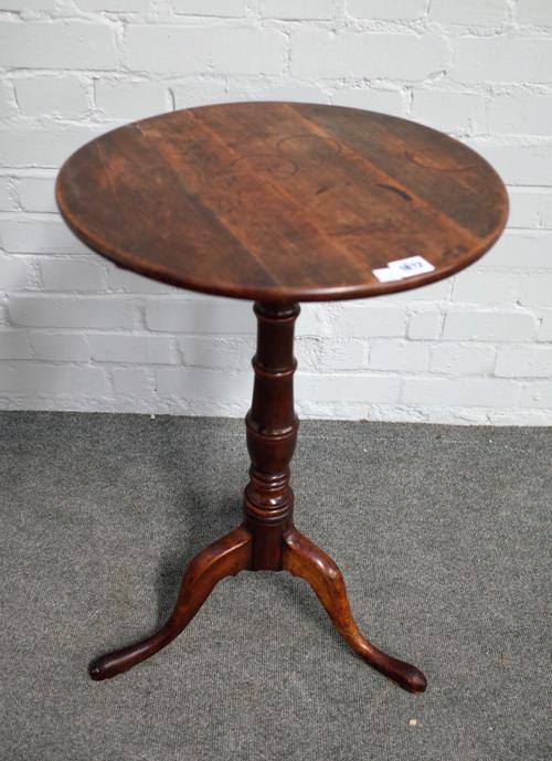 A mid-18th century oak circular snap top tripod occasional table, 45cm diameter x 70cm high.