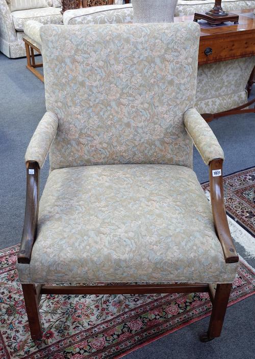 A George III and later mahogany framed Gainsborough armchair on sqaure supports, 73cm wide x 102cm high.