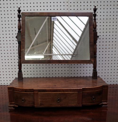 A Regency inlaid mahogany toilet mirror with bow three drawer base, 56m wide x 58cm high.