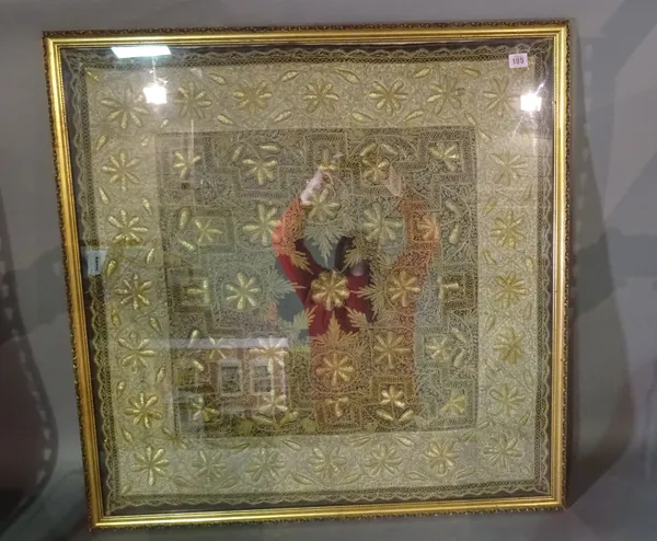 A large Eastern embroidered panel with gold thread decoration, framed and glazed, 86cm square., a beadwork polescreen and a sun compass, (3).  CAB