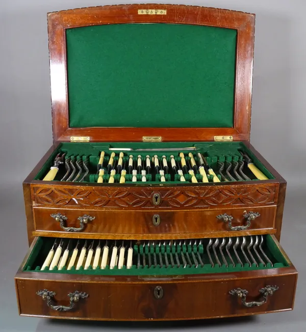 A 20th century mahogany bowfront canteen cutlery with lift top and two fitted drawers.   F7   1753