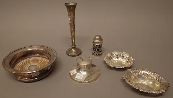 Silver and silver mounted wares, comprising; a circular capstan shaped inkwell, Birmingham 1909, two bonbon dishes, a specimen flower vase and a peppe