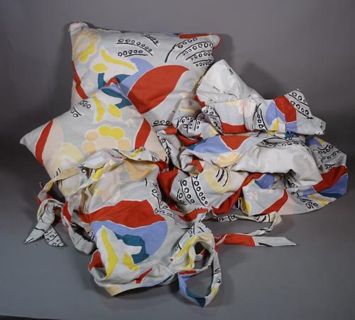 In the manner of Picasso;  textiles including two cushions, two pairs of curtains, a single bed spread and sundry, (qty).   BAY 2  288