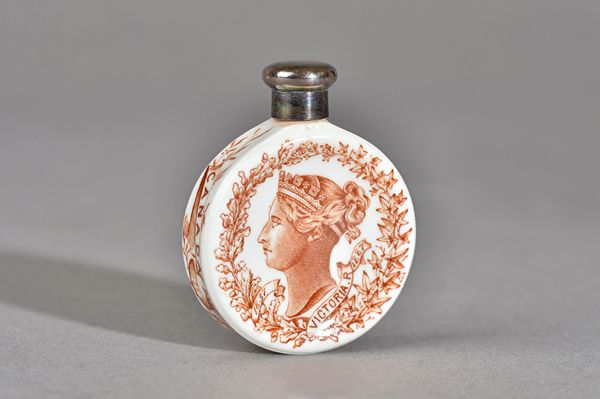 A Victorian silver mounted Royal Worcester porcelain scent bottle, the front decorated in brown with the portrait of The Queen and detailed 1837 Victo