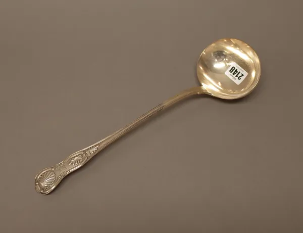 A Victorian silver double struck King's pattern soup ladle, crest engraved, London 1858, weight 298 gms.