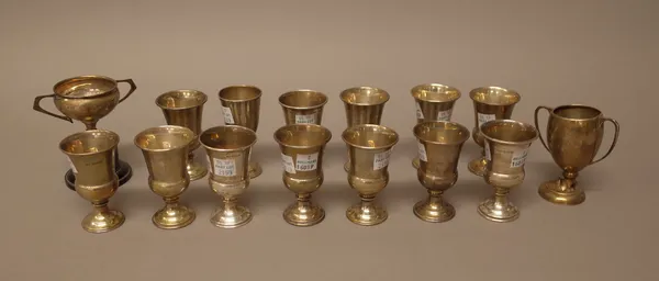 Fifteen silver small trophy cups, mostly presentation inscribed, including one fitted to a black stand, combined weight of weighable silver 380 gms, (