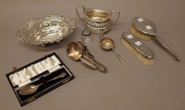 Silver and silver mounted wares, comprising; a late Victorian shaped oval bonbon dish, with embossed and pierced decoration, raised on four spherical