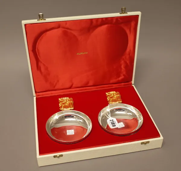 A pair of Aurum silver and silver gilt limited edition dishes, made by order of The Dean and Chapter of York to commemorate The 500th Anniversary of T