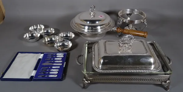 A silver plated warming pan and cover, a lidded entree dish, three glass serving dishes on concertina stands and further plated wares, (qty).  S2T