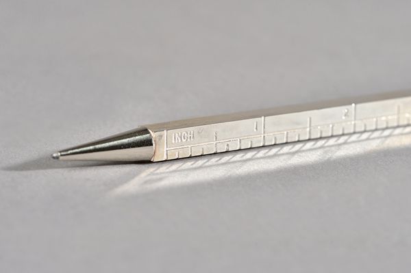 A silver 12 inch / 30 centimetre ruler of square section form with a propelling pencil to one end, London 1973, with a case. 1626