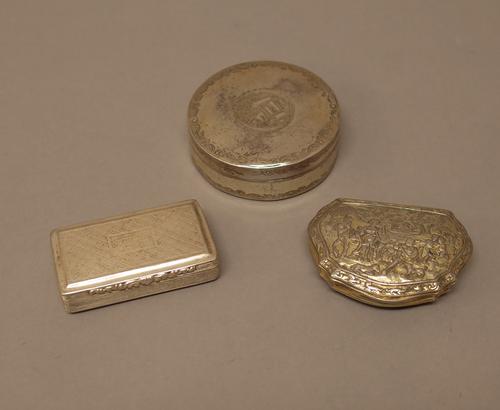 Foreign and plated wares, comprising; a cartouche shaped snuff box, the cover decorated with figures in a landscape setting, a rectangular snuff box,